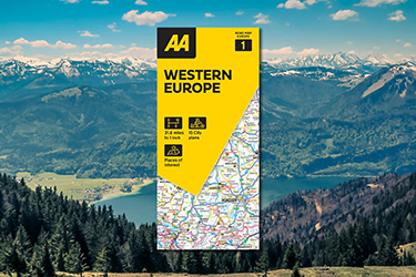 AA Road Map Western Europe against a background image of Austrian countryside.