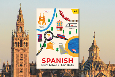 AA Spanish Phrasebook for Kids against a background image of Seville Cathedral.