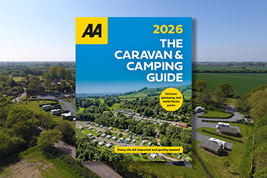 AA's Caravan & Camping Guide 2026 against a background image of caravans in a field.