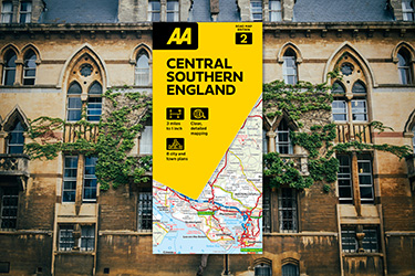 AA Road Map Britain against a background image of a house.