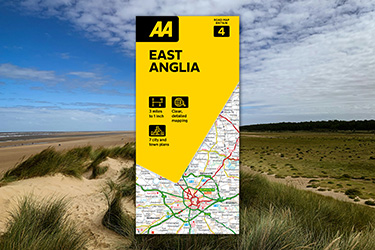 AA Road Map East Anglia against a background image of the coast.