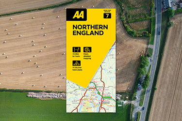 AA Road Map Northern England against a background image of a bird's eye view of countryside fields.